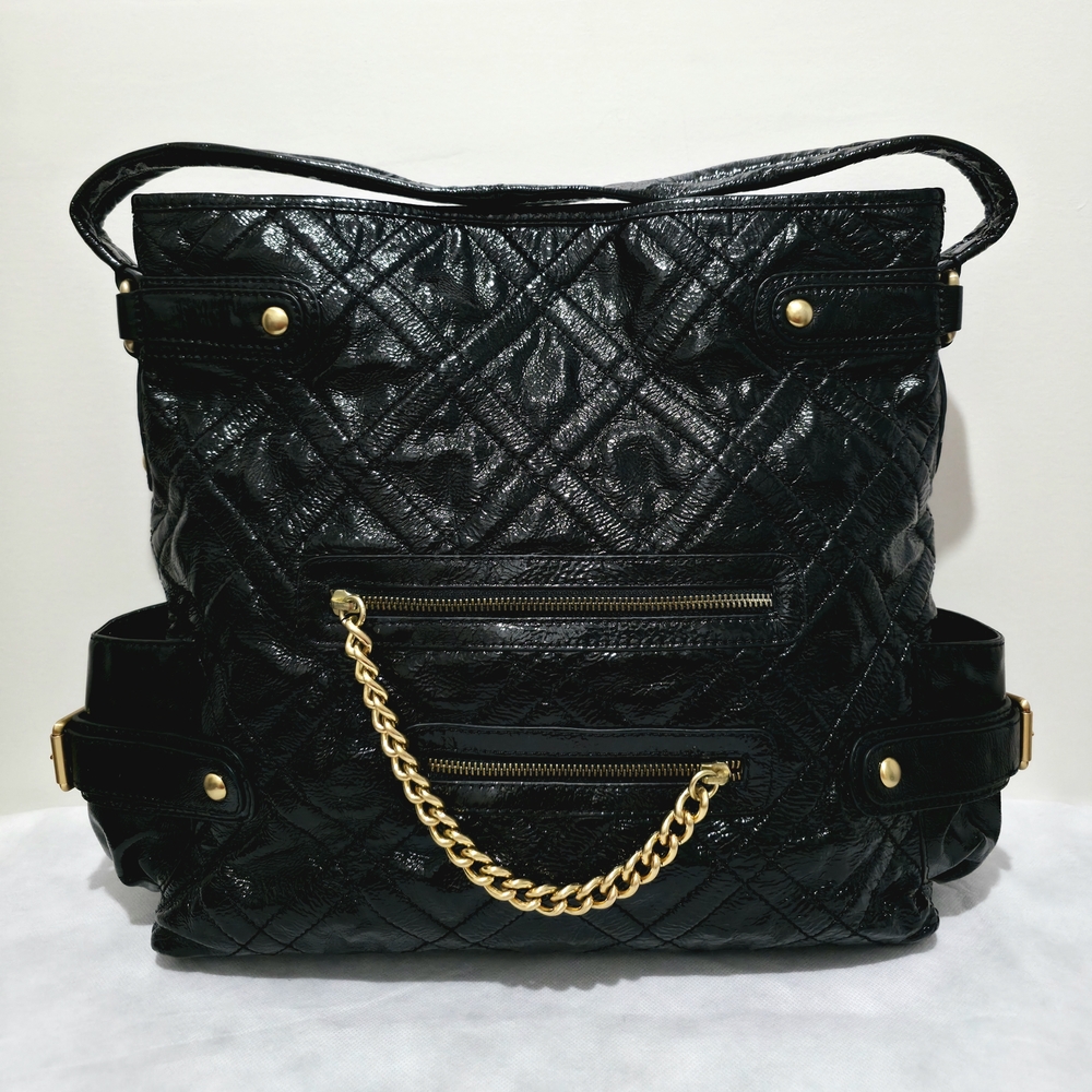 Isabella Fiore Black Quilted Backpack with Gold Accents
